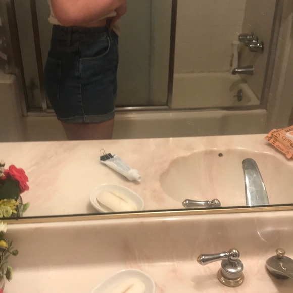 High waisted, medium wash denim shorts. - Picture 6 of 6